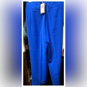 Skies are Blue trousers color is  Neon Blue Size XS. Tags are still attached